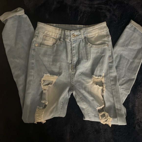 Denim - light blue ripped jeans